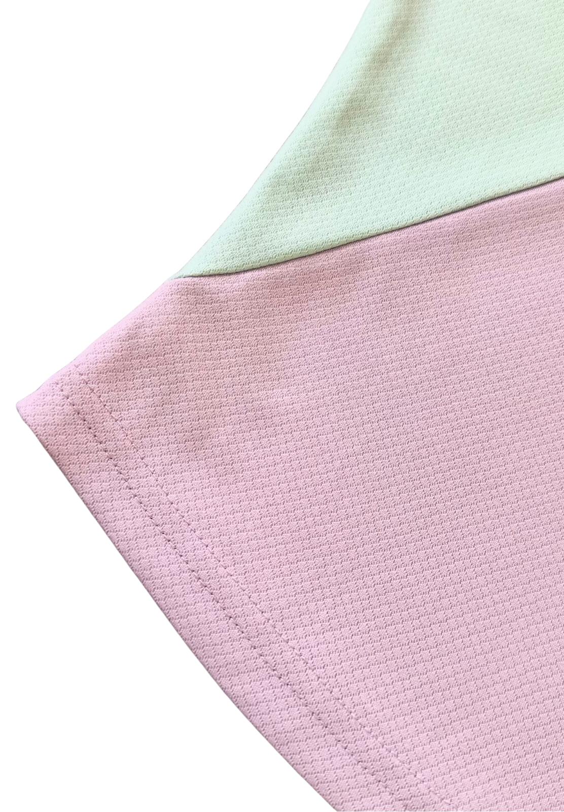 Close-up of Dani Soccer Shirt's pink and green diagonal block design with knitted jacquard fabric.