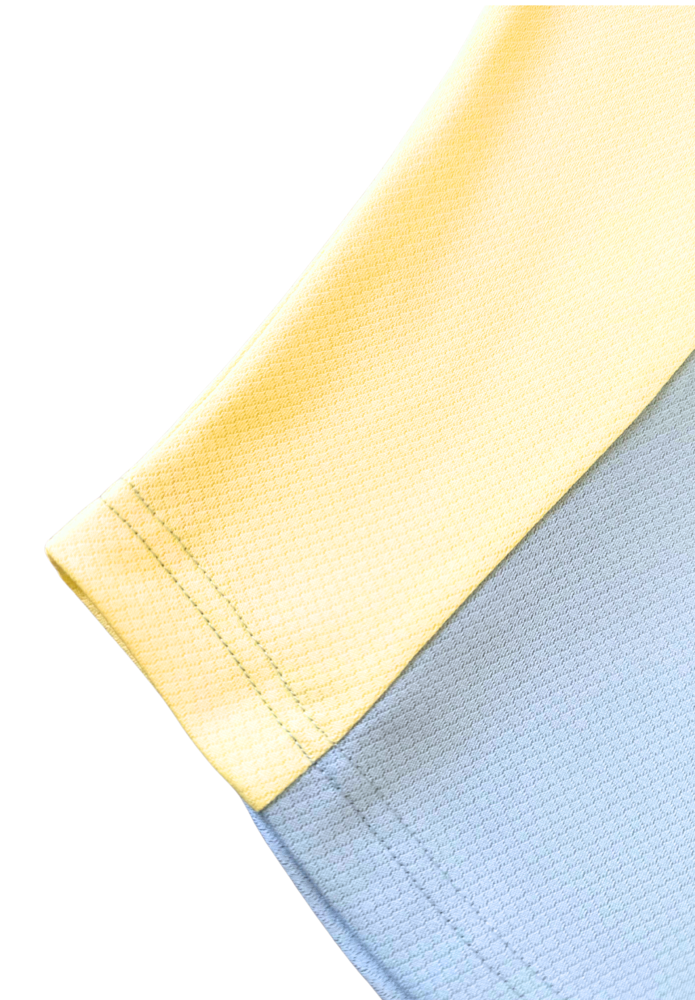 Pastel purple and yellow block design on Lucia Soccer Shirt.