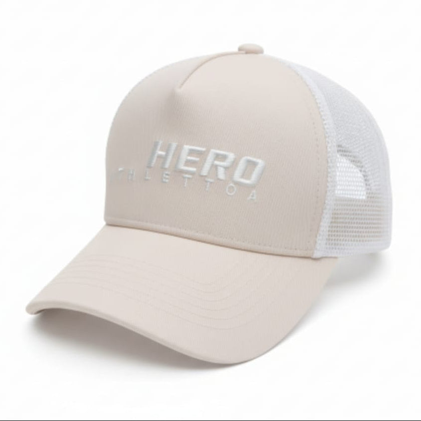 Beige cap with white mesh back and 'HERO' branding on a white background